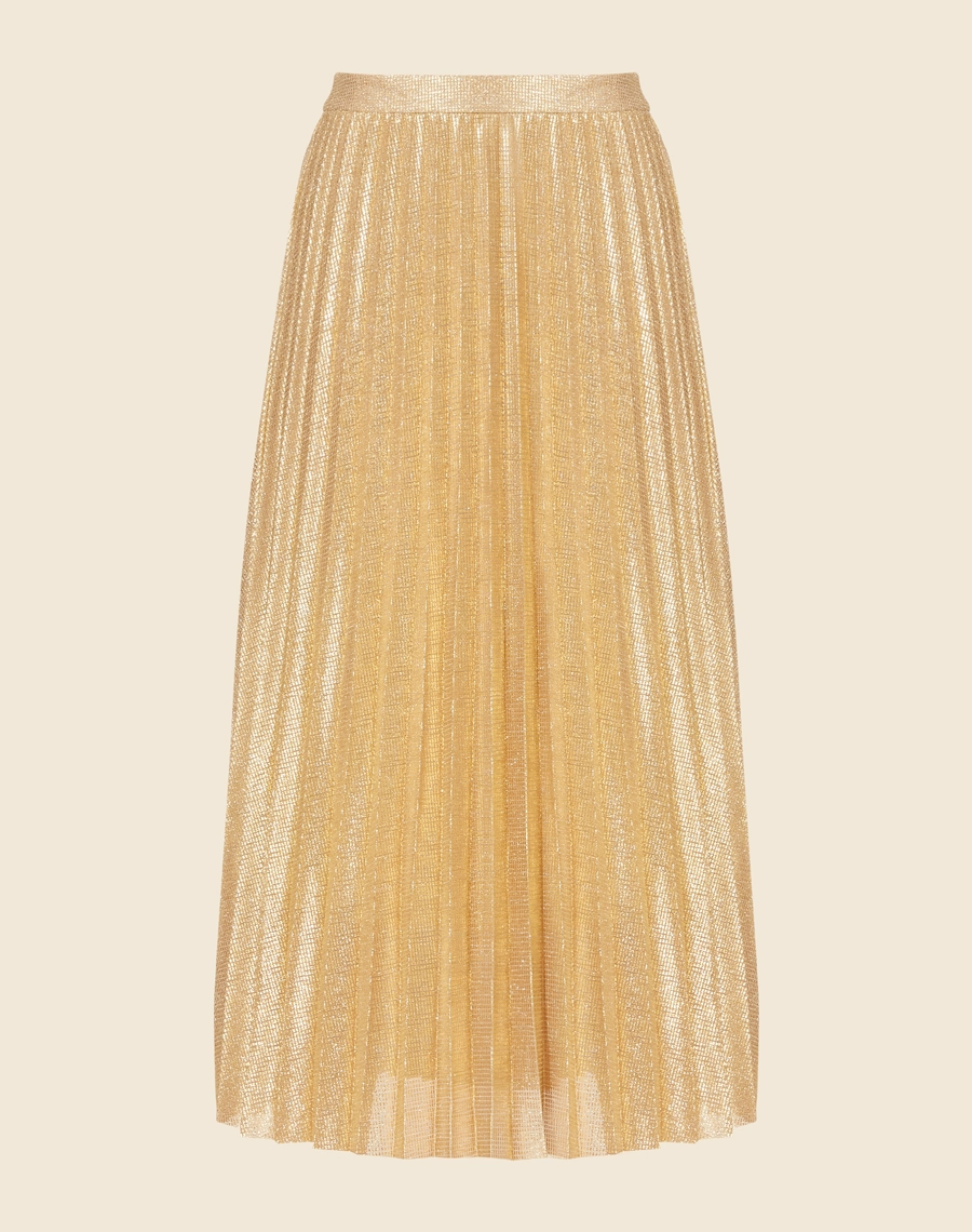 Saia Desirée confeccionada em Lamê. <br>
Peça plissada, de comprimento midi e modelagem evasê. <br>