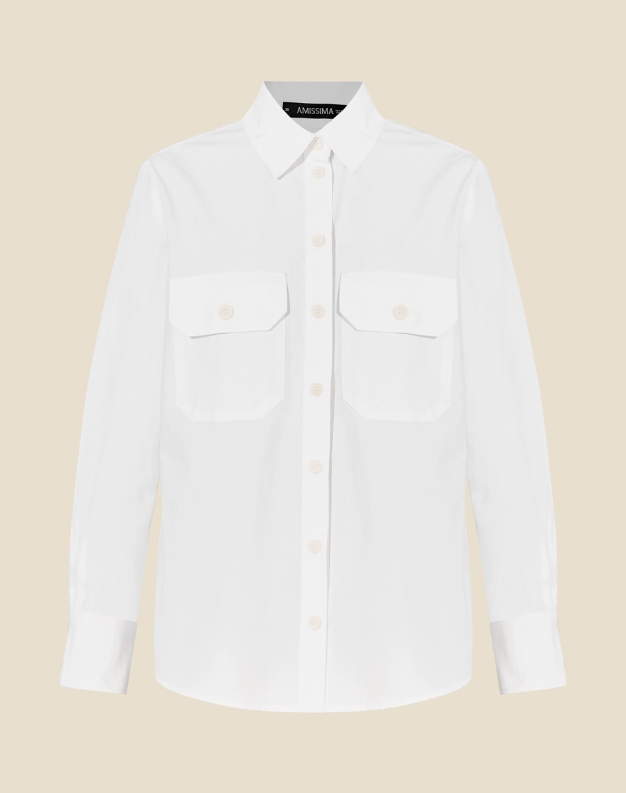 Camisa Celine confeccionada em Cotton Supreme maciez incomparável, alta durabilidade e conforto máximo, elevando o básico a um novo patamar de luxo.

 <br/>
Com gola esporte com fechamento por botão de casa. Mangas longas com botões nos punhos <br/>
Possui bolsos com lapelas e modelagem ampla.<br/>