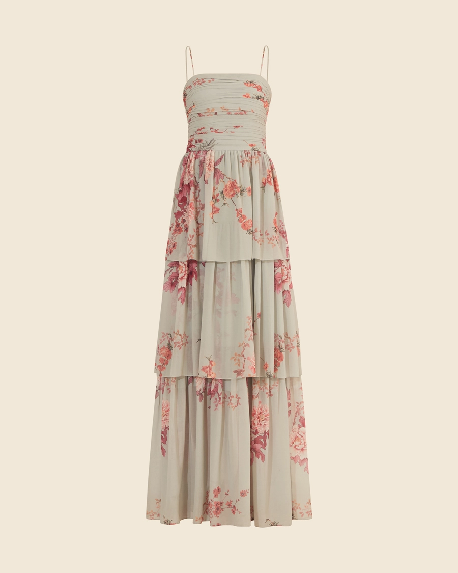 Vestido Longo Belinni é confeccionado em chiffon estampado, garantindo leveza e movimento a cada passo.<br/>
Com alças finas e busto drapeado, ele valoriza o colo de forma delicada, enquanto a saia em camadas cria um efeito esvoaçante, ideal para eventos ao ar livre e ocasiões especiais. <br/>
A estampa floral traz um toque romântico e sofisticado, perfeito para mulheres que desejam um look encantador e delicado.<br/>