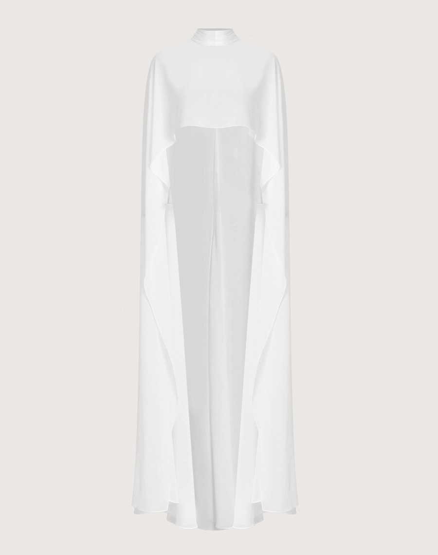 Capa Grazy é confeccionada em chiffon, um tecido leve e esvoaçante, que oferece um toque de sofisticação e delicadeza.