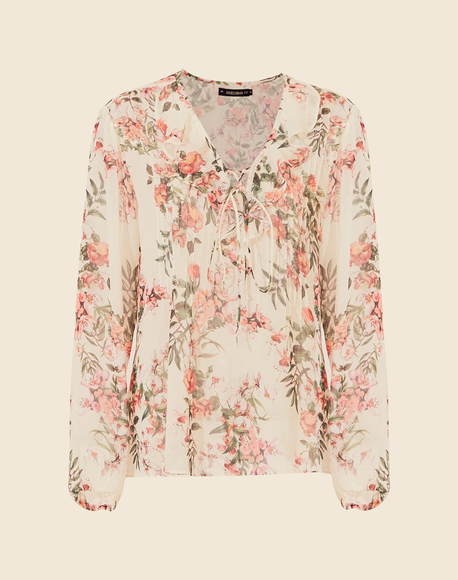 A Blusa Andressa é confeccionada em crepinho estampado. A estampa floral Amissima traz um toque clássico e moderno, tornando essa blusa perfeita para diversas ocasiões, desde almoços casuais até coquetéis sofisticados. 