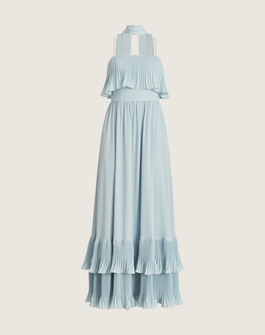 O Vestido Longo Nancy com seus babados em plissado é a escolha ideal para ocasiões especiais, unindo conforto e sofisticação em um visual naturalmente encantador!