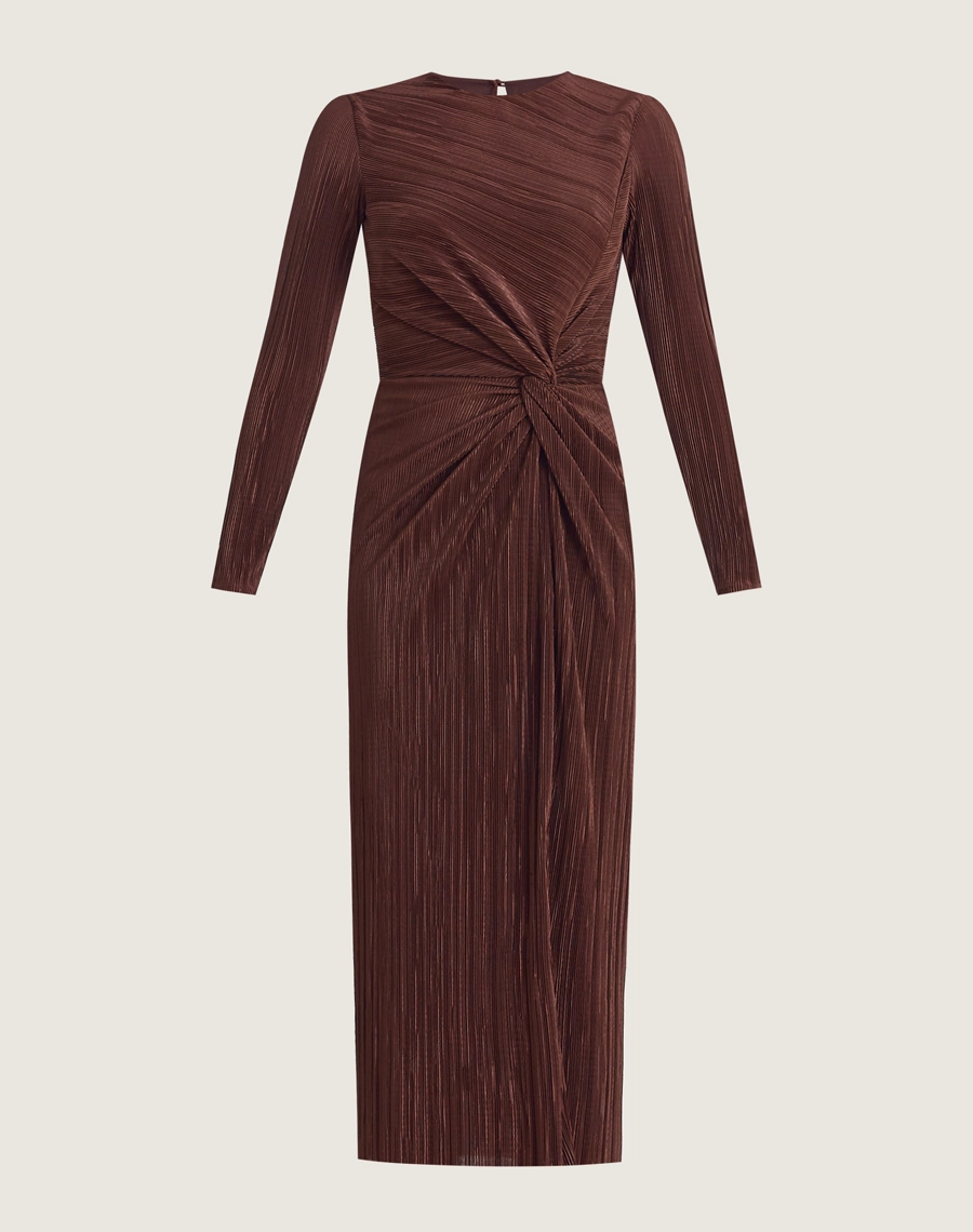 O Vestido Midi Daisy é confeccionado em malha plissada, conhecido por sua elasticidade, conforto e caimento impecável.