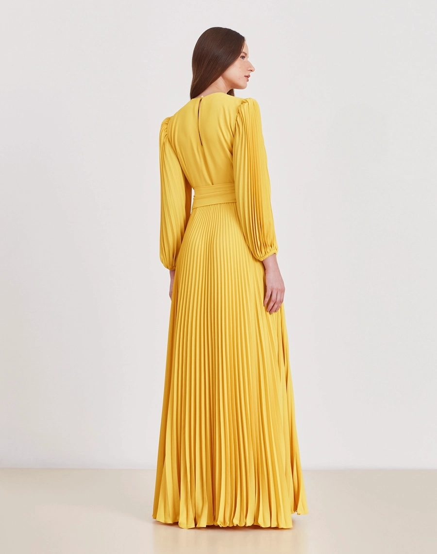 Vestido Longo Soleil, confeccionado em crepinho, é um tecido leve e fluido, conhecido pelo caimento suave e pela excelente movimentação.