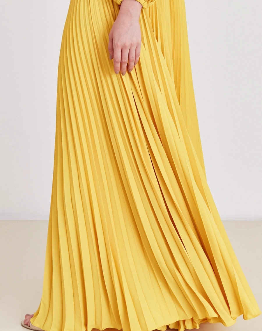 Vestido Longo Soleil, confeccionado em crepinho, é um tecido leve e fluido, conhecido pelo caimento suave e pela excelente movimentação.