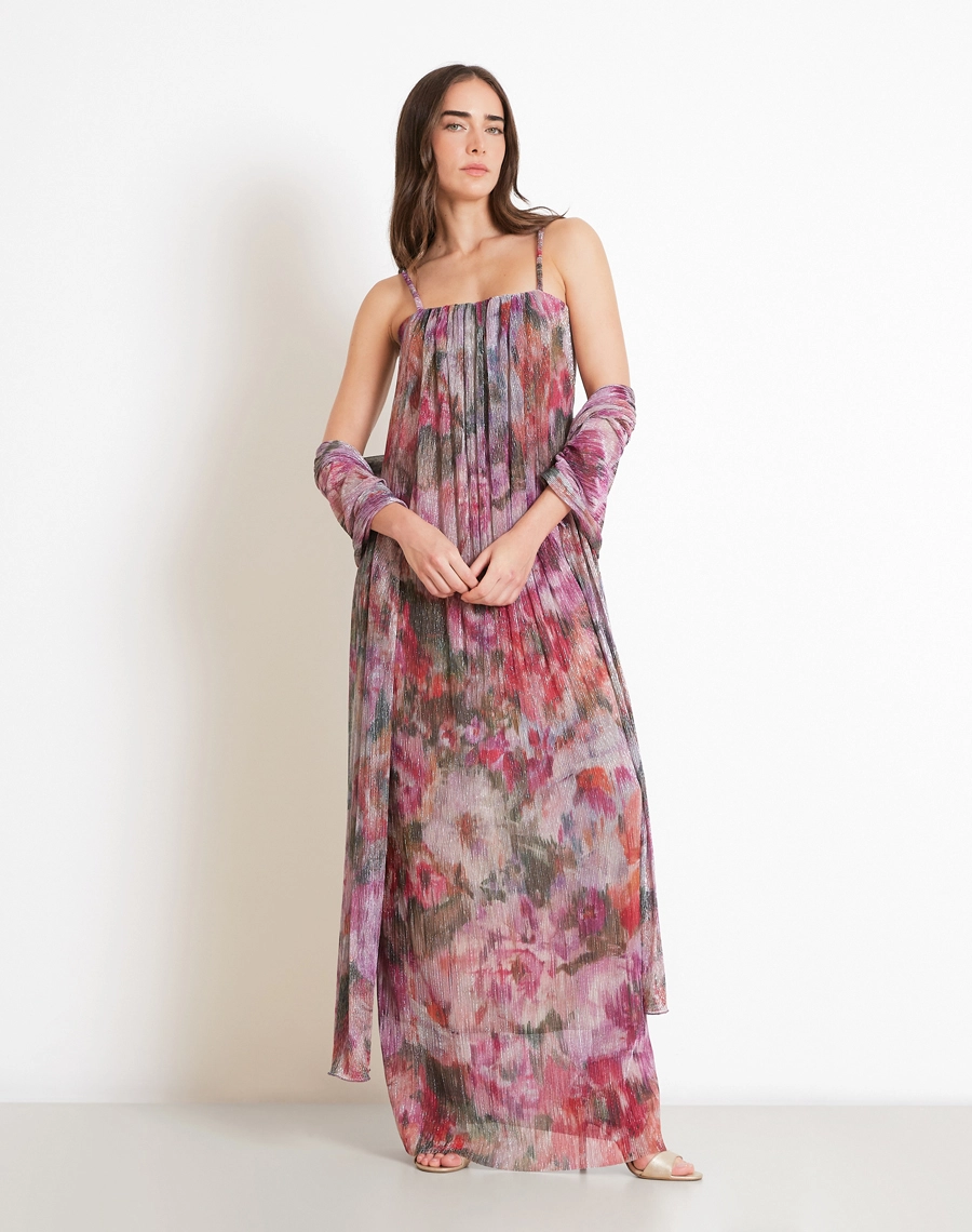 O Vestido Longo Alessandra é confeccionado em malha plissada, tecido leve, com toque macio, excelente caimento e movimento fluido.