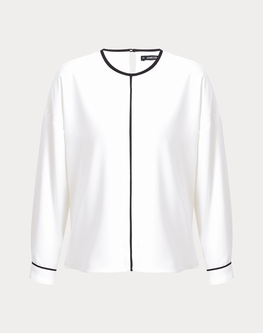 A Blusa Melissa é confeccionada em Crepe Zara, tecido de toque suave e acabamento levemente texturizado, com caimento fluido que não marca o corpo. 