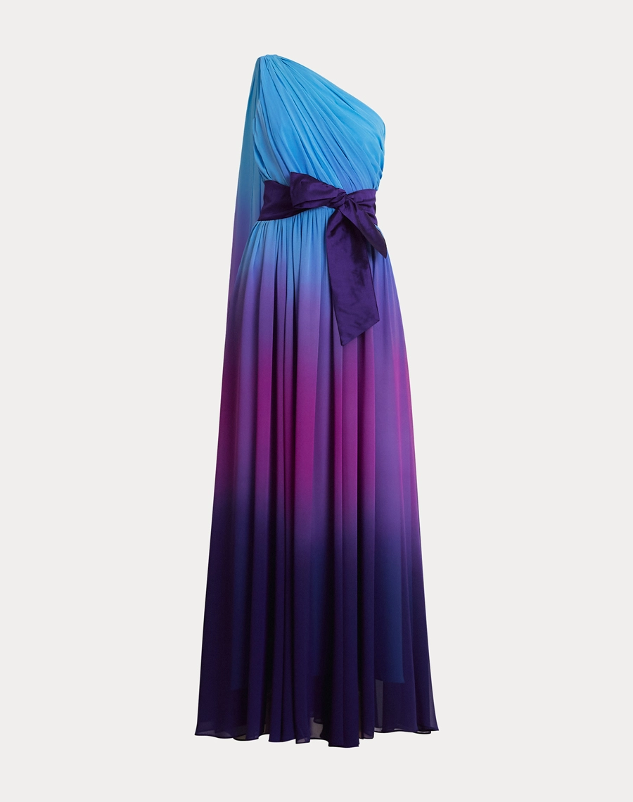 O Vestido Longo Aurea é confeccionado em Chiffon com efeito degradê em tons vibrantes, um tecido leve e fluido que confere sofisticação e movimento à peça.<br/>
