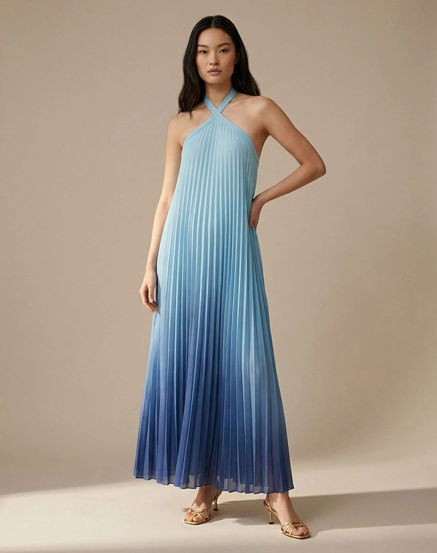 O Vestido Longo Thassia é confeccionado em Chiffon, tecido leve e sofisticado, possui transparência sutil e caimento fluido que valoriza o movimento da peça.