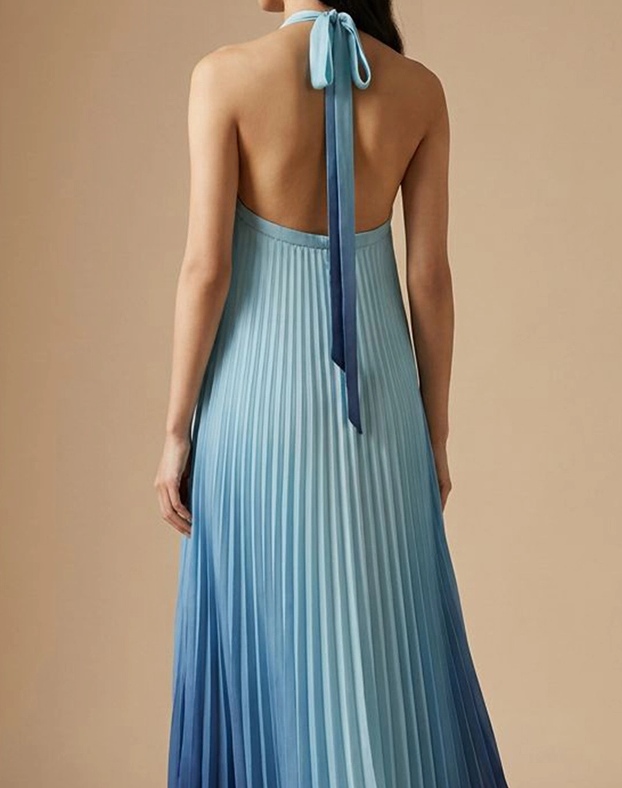 O Vestido Longo Thassia é confeccionado em Chiffon, tecido leve e sofisticado, possui transparência sutil e caimento fluido que valoriza o movimento da peça.