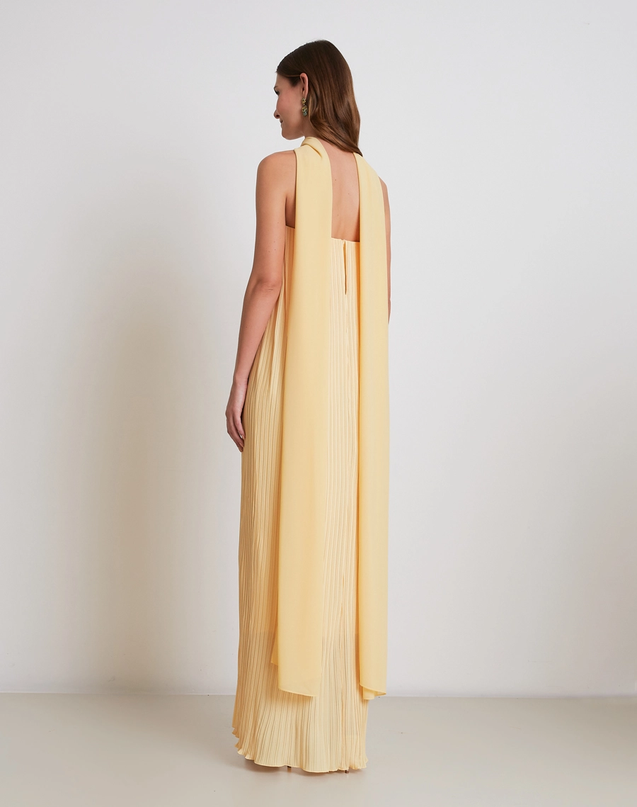O Vestido Longo Art é confeccionado em crepinho plissado com textura delicada e caimento fluido, proporcionando leveza, movimento e um visual sofisticado.

<BR/>