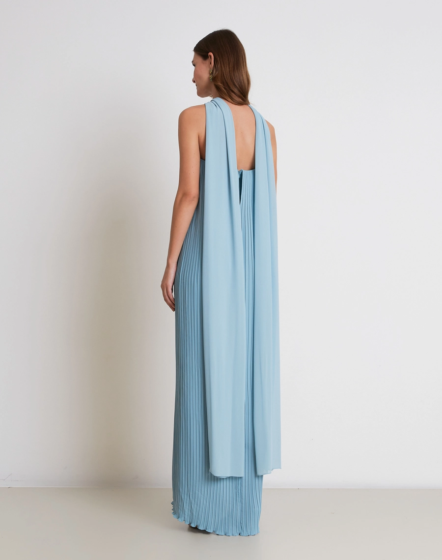 O Vestido Longo Art é confeccionado em crepinho plissado com textura delicada e caimento fluido, proporcionando leveza, movimento e um visual sofisticado.

<BR/>