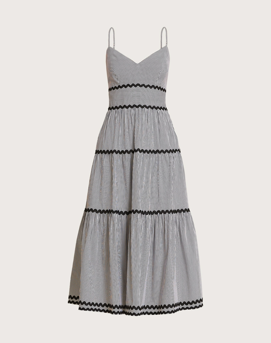O Vestido Midi Rute é confeccionado em algodão listrado, um tecido leve, respirável e de toque macio, que une conforto e elegância. <br/>
