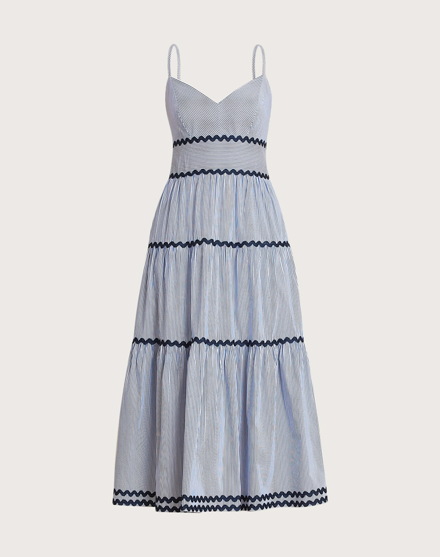O Vestido Midi Rute é confeccionado em algodão listrado, um tecido leve, respirável e de toque macio, que une conforto e elegância. <br/>