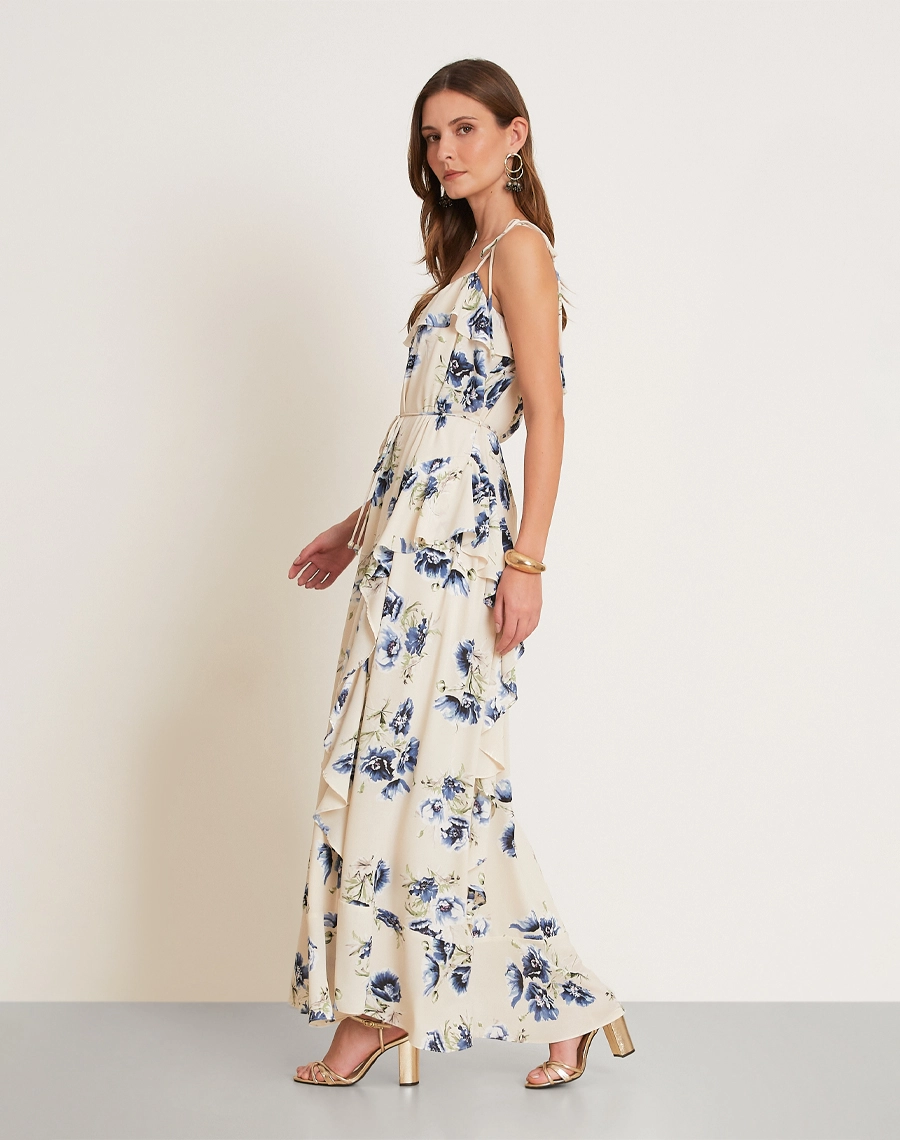 O Vestido Longo Dalia Blue é confeccionado em crepinho, tecido de textura delicada e caimento fluido, proporcionando leveza, movimento e um visual sofisticado. <br/>