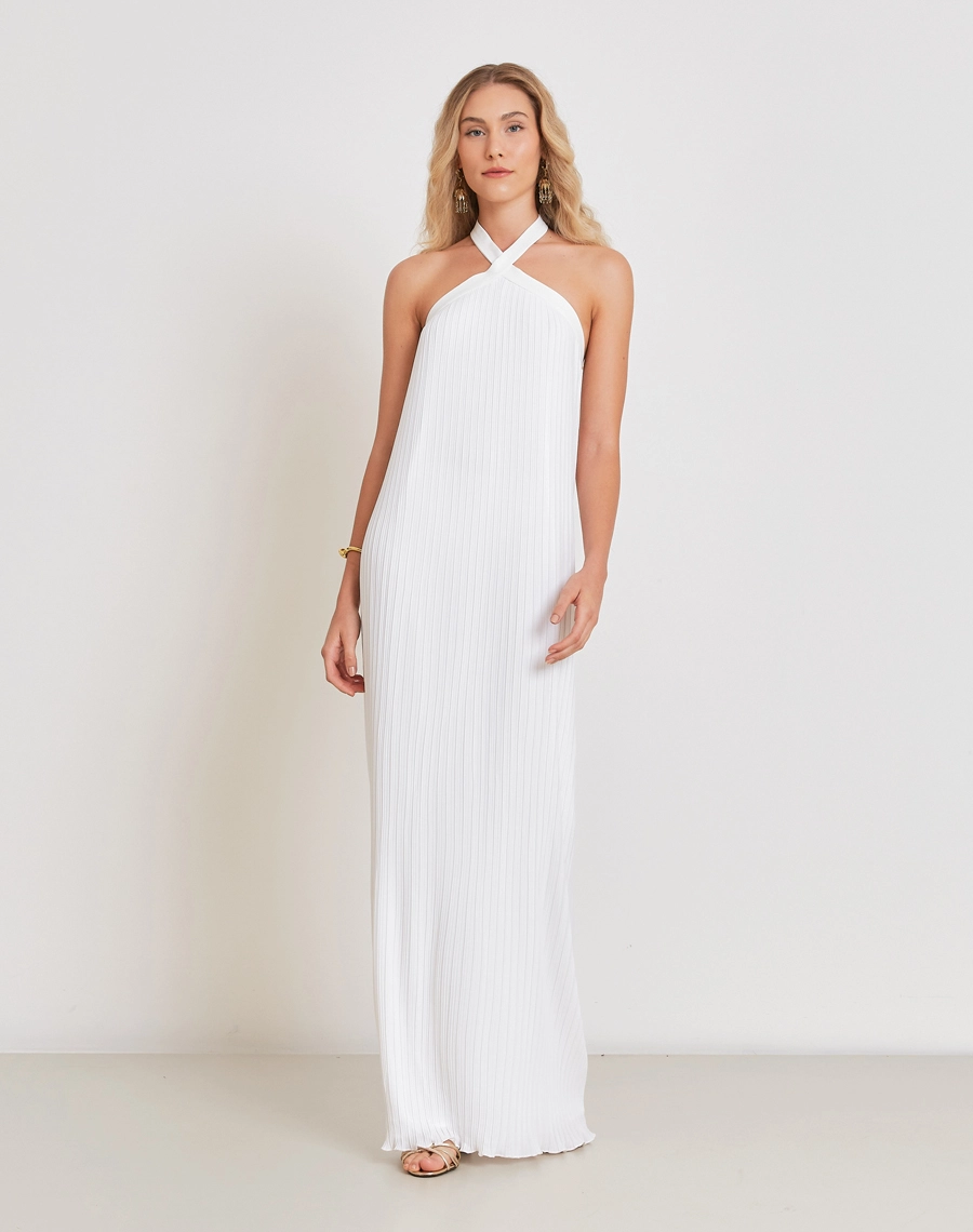 O Vestido Longo Angeline é confeccionado em tecido crepinho, que oferece leveza, fluidez e um caimento delicado ao corpo.