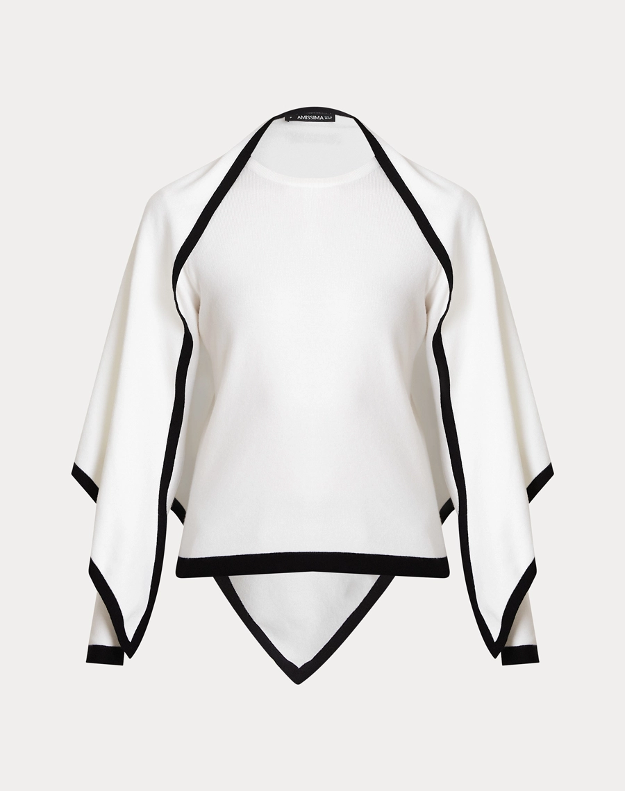 A Blusa Com Xale Coco é confeccionada em tricô, tecido leve, com toque macio e caimento fluido que proporciona conforto e elegância. 